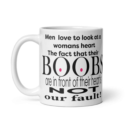 Men love to look at a womans heart. The fact that their BOOBS are in front of their heart is NOT our fault! - White glossy mug - Horrible Designs